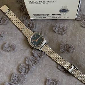 Nixon small time teller navy/rosegold silver watch